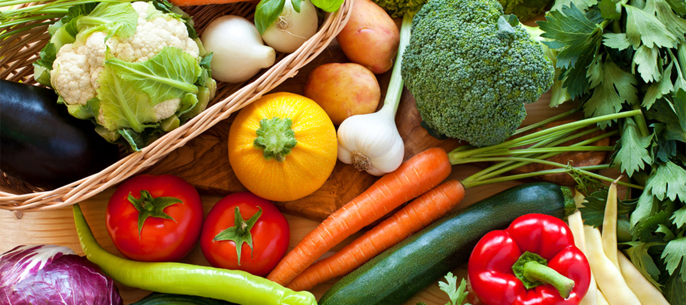 Plate full of vegetables, including broccoli, carrots and potatoes