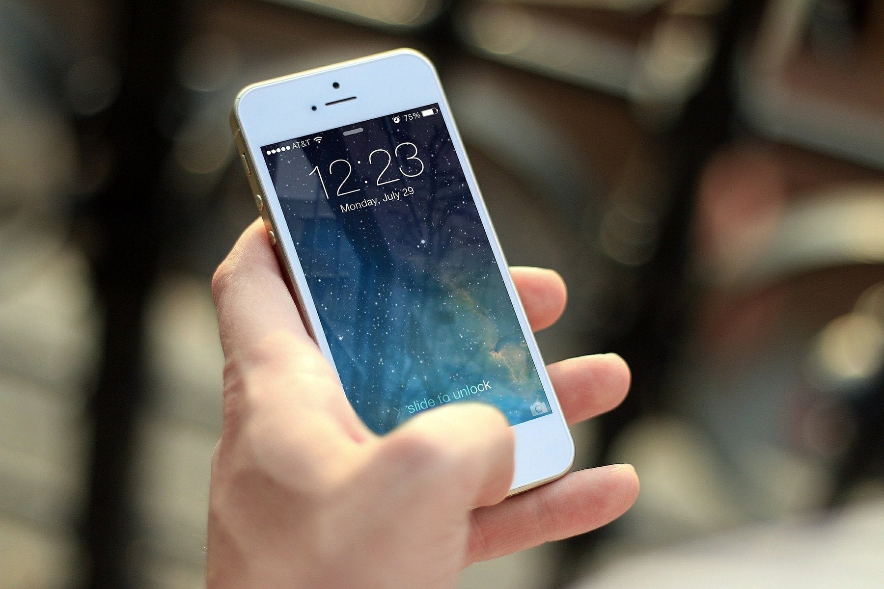 Man holding a white phone