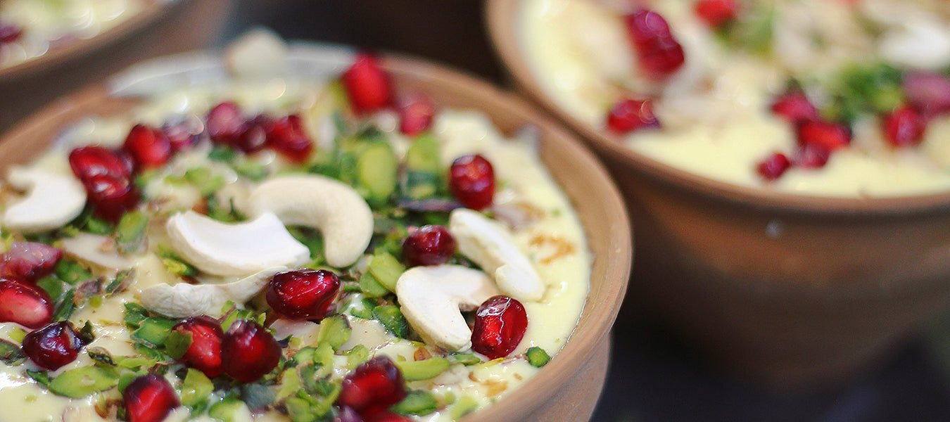 Healthy meal in a bowl with cashew and pomegranate