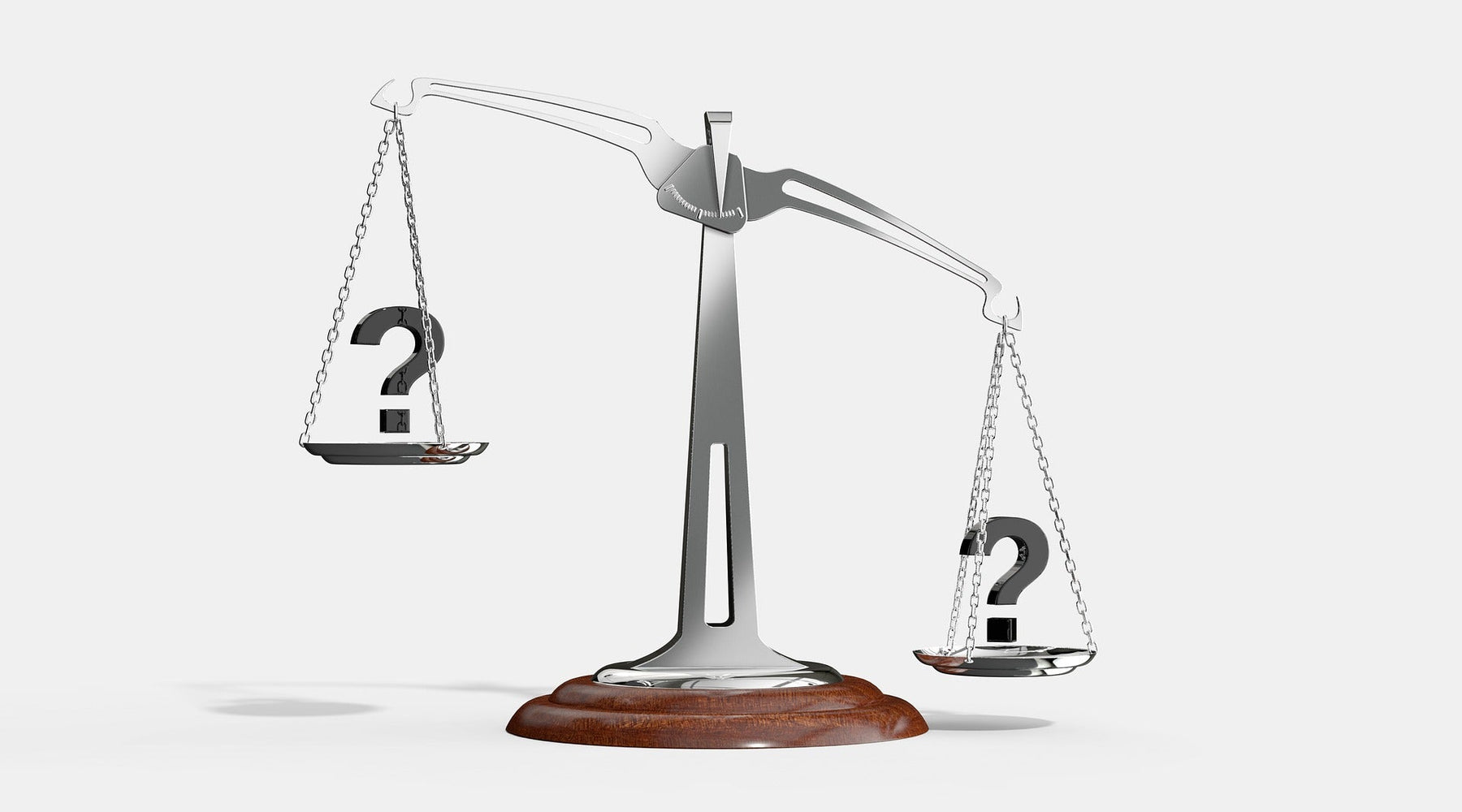 Metallic balance with question marks on each side