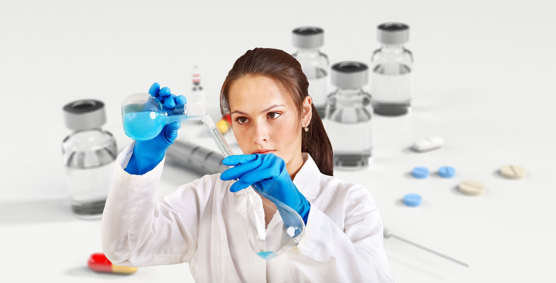 Laboratory woman with blue gloves pouring liquid