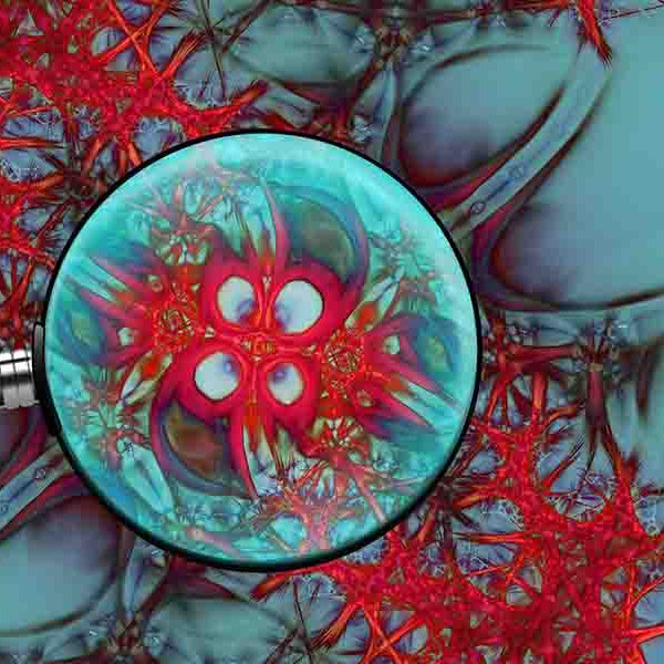 Magnifier over red matter over a blue surface
