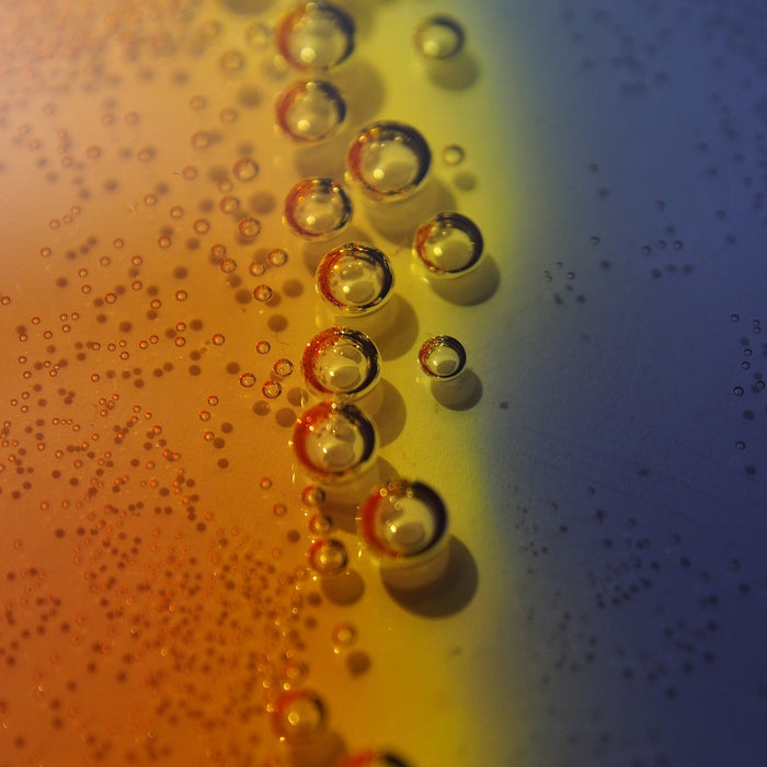 Bubbles in a middle of an orange and blue surface