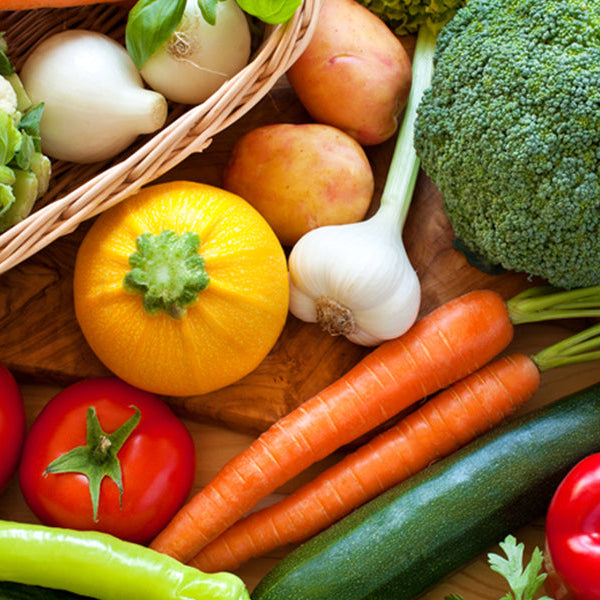 Plate full of vegetables, including broccoli, carrots and potatoes