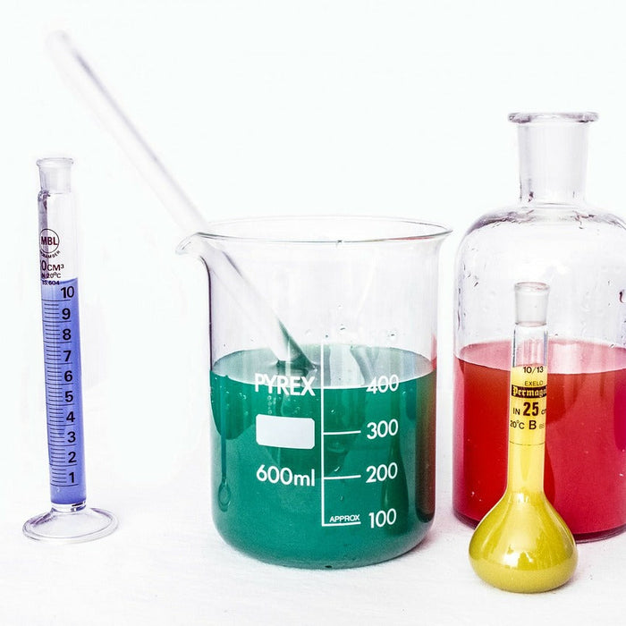 Laboratory glasses with different liquid colors