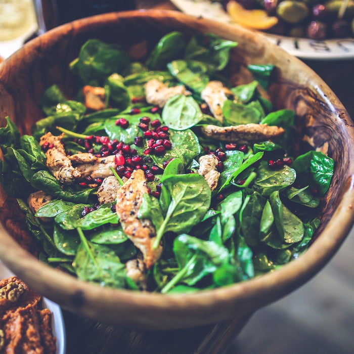 A bowl of salad on a table