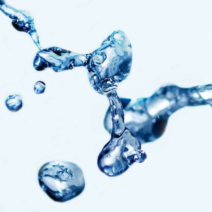A splash of water splitting up in the air