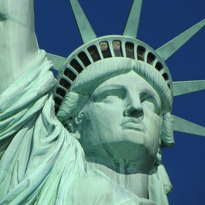 Statue of liberty on a blue sky