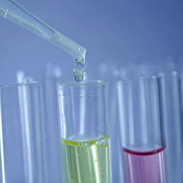 Glass recipients getting liquid of different colors